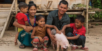 A family with a donated pig provided through GFA’s Christmas gift catalog. They are just one of thousands of Asian families helped to break out of extreme poverty, which is the focus of GFA’s “Forgotten Christmas” campaign.