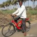 Darin no longer has to walk everywhere thanks to the new bicycle given to him through a GFA-supported Christmas gift distribution.