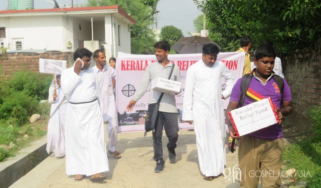 GFA-supported workers & their families held a rally to support the flood victims. Collecting donations to send to the devastated population in Kerala, India