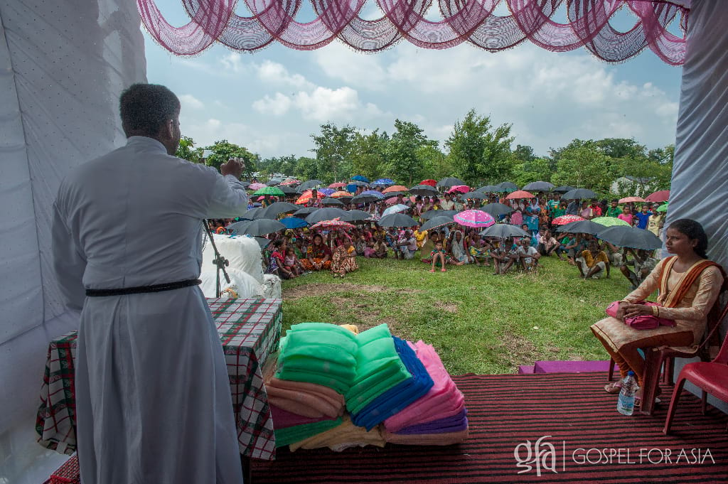 GFA workers also distribute practical gifts, where being given a mosquito net helps people put what they learn at awareness programs into practice.