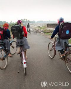 A girl on a bicycle zipped past as she walked to school. Karrah likely sighed enviously as she trudged the steps of her 3 mile journey